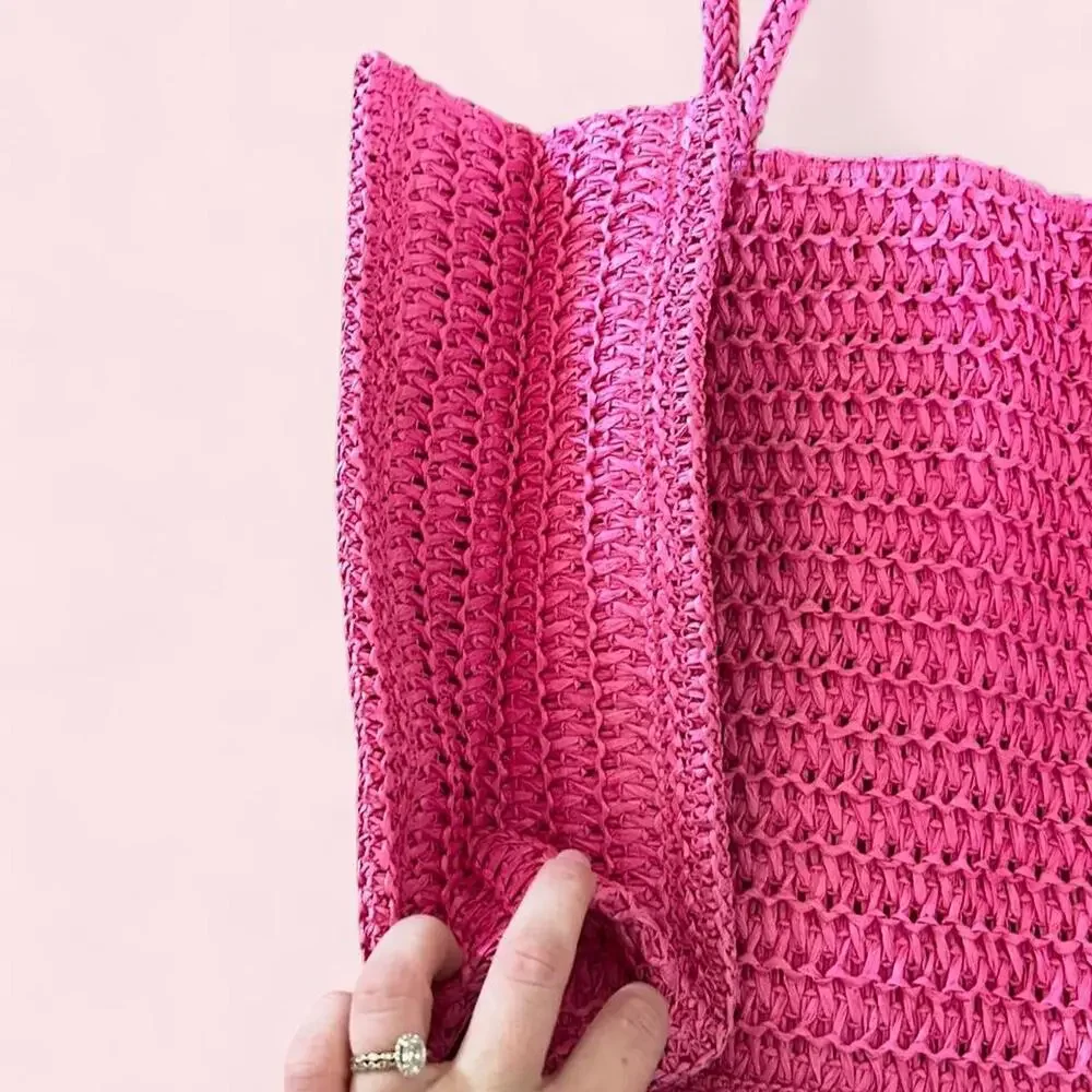 Pink Juicy Couture woven tote bag with braided handles